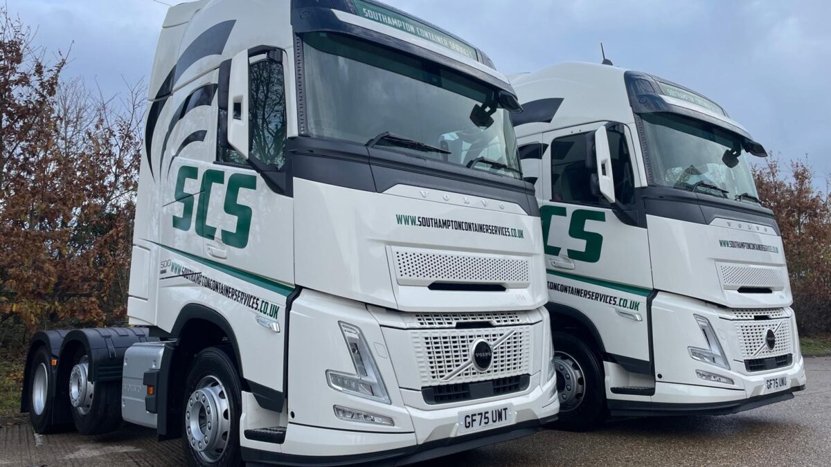 Two new Volvo FH Aero trucks in Southampton Container Services livery parked side‑by‑side at MC Truck & Bus Southampton.